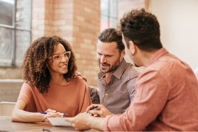 Financial consultant working with couple