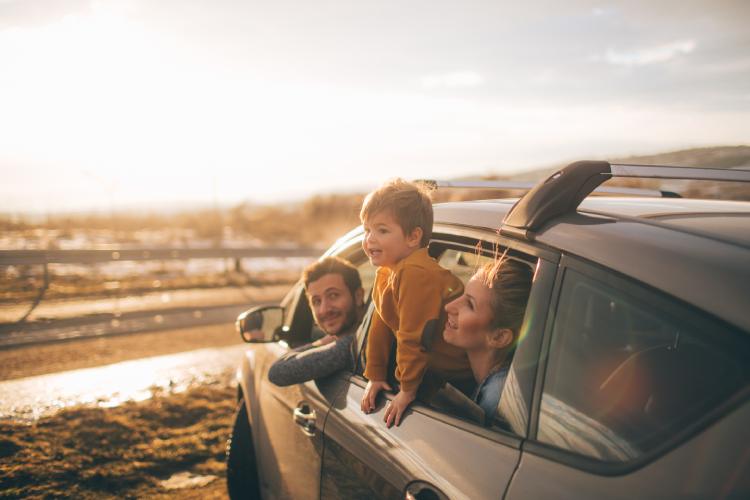 happy family in vehicle